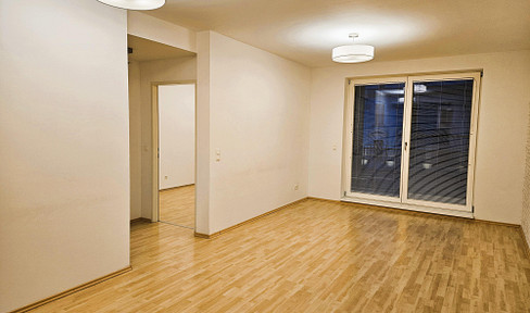 Quiet, conveniently located 2-room apartment with balcony & inner courtyard in a modern passive house