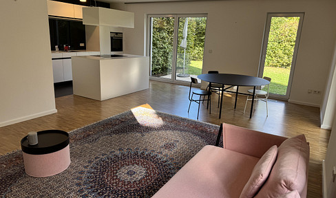 3-room designer apartment with over 100 m2 garden in zero-heating energy passive house: 6.8 kWh/(m2a)