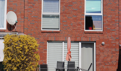 Partially renovated terraced house.