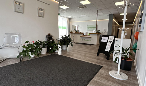 Prime location with high foot traffic: Retail space with 8 meters of display windows plus 10 parking spaces.