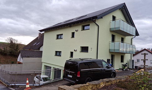 Air-conditioned 3-room new-build apartment (2024) with fitted kitchen & balcony in a very quiet location