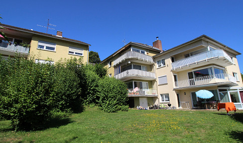 Spacious 4-room apartment (105 m²) with balcony, far-reaching views, fireplace & garage