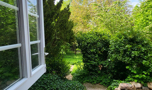Dreamlike residential property with a beautiful natural plot of land and an additional building plot.