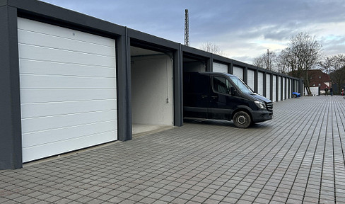 XXL garage/warehouse, car garage, self-storage containers, video surveillance, and fenced property.