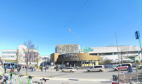 Apartment in Munich, located in the Olympia shopping center, available without commission, with a west-facing balcony.