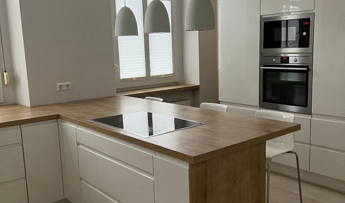 House character Charming 5.5-room apartment in an old building with fitted kitchen and large garden