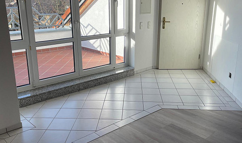 Bright 3-room attic apartment in an attractive location