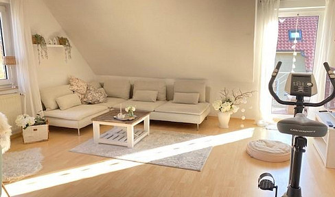 Modern, 4.5-room maisonette apartment, approximately 108 square meters, located in the city center, with a balcony.