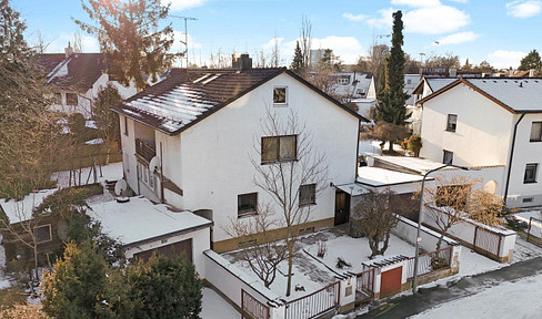 Available immediately! Detached two-family house with 2 garages!