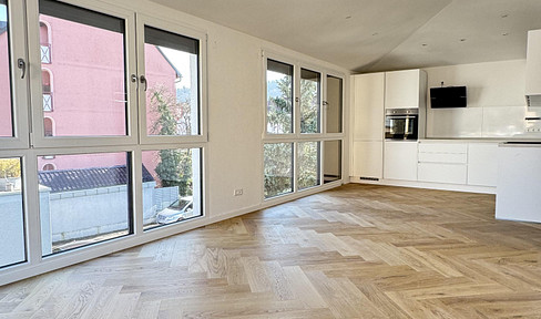 Modern 3.5-room apartment with garden area, designer kitchen & oak parquet flooring