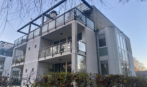 Attraktive Wohnung mit Südbalkon, Parkblick und Tiefgaragen Stellplatz