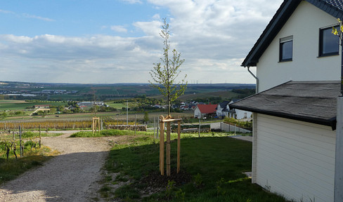 Exclusive semi-detached house in Essenheim - living at the highest level with a far-reaching view ELW possible