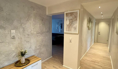 High-quality renovated 3-room apartment with underground parking, elevator & balcony - ready for immediate occupancy