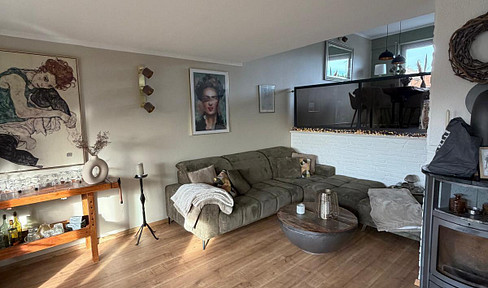 Modernized terraced house with exceptional architecture - right next to the field & Hardter Wald forest