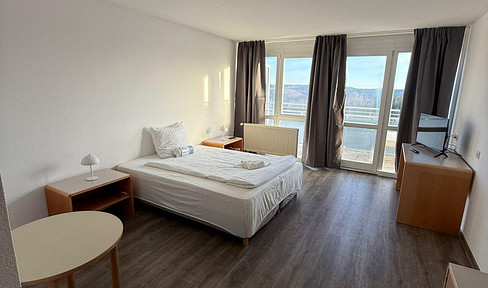 Sunny double rooms with stunning views, available for monthly rental.