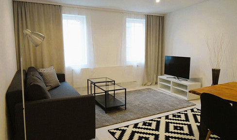 central, yet quiet. Modern and bright apartment with parking space
