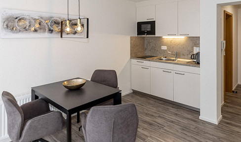 Cozy, fully furnished 2-room apartment in a quiet location with parking space