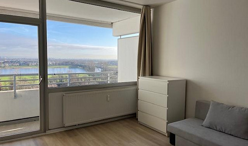 TOP: furnished apartment with view of the Rhine and large south/west-facing balcony