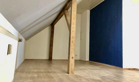 Loft-style maisonette apartment with an open and airy living space in Remscheid-Lennep.