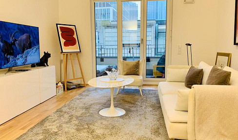 2.5-room apartment with a balcony and a view of the skyline.