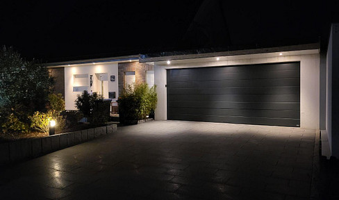 Modern living with a pool, outdoor living space, and high-quality features, including energy-efficient home technology.