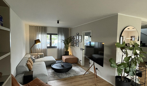 As-new 142m² 4-room apartment with upscale furnishings, garden and 2 parking spaces