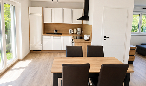 Furnished, newly built 2-room apartment, with a terrace and parking space for a car.