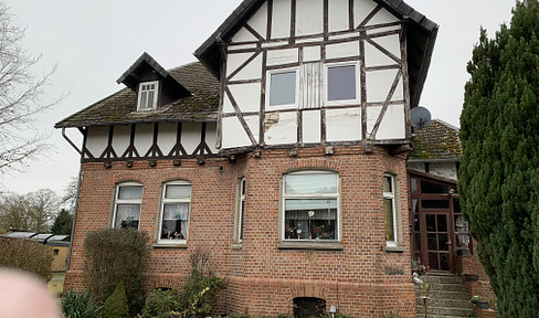 Detached house with full basement, outbuilding with granny apartment and storage rooms.