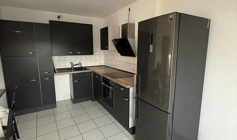 Bright top floor apartment in a prime location in Neuss including kitchen