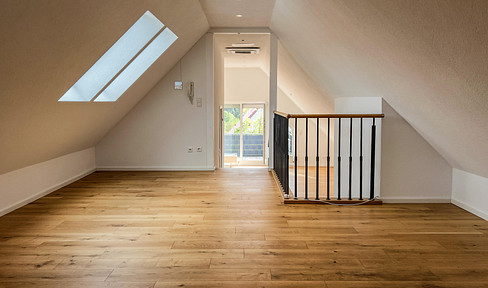 Modern 4-room maisonette with open-plan living concept, balcony & underground parking space in a top location