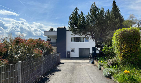 Special renovated single-family or two-family house with a wide view of the Jagst valley, and a large garden offering privacy.