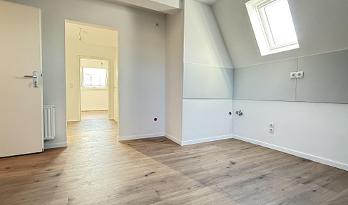 Moderne 1,5 Zi-Dachgeschosswohnung in einer Stadtvilla