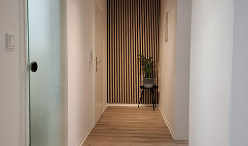 "Move in & feel good" Renovated 2 room apartment + garage at the spa gardens