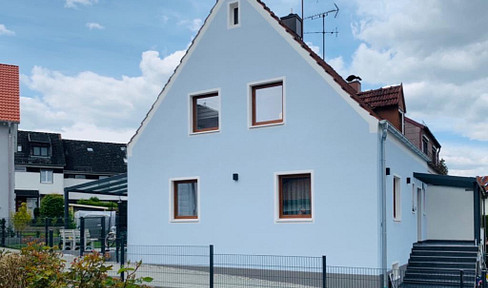 Charming semi-detached house – completely renovated and fully basemented.