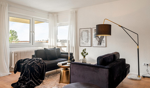 Modernized 3-room apartment with balcony and parking space