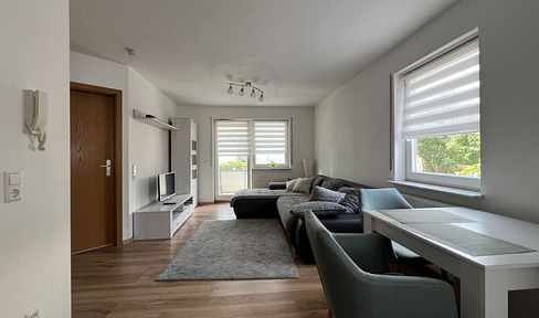 Bright 2-room apartment with balcony and fitted kitchen near the train station