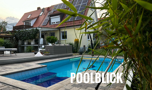 Your private paradise for two – A stylish house with a pool, double garage, and a beautiful garden.