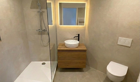 Loft character: freshly renovated 2-room apartment (48m²) with fitted kitchen