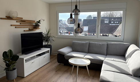 Stylish 4-room top-floor apartment with south-facing balcony, garage & parking spaces in Ebersweier