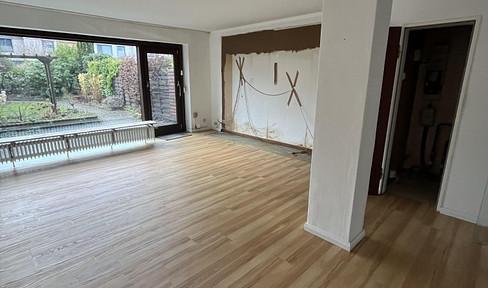 End terraced house with garage at the house, in need of renovation