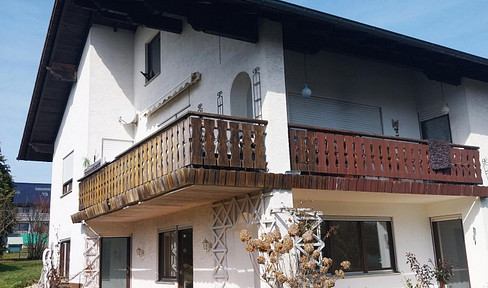 Large residential building in the Baden-Württemberg region, featuring a spacious garden.