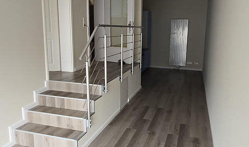 Erstbezug! Stilvolle 2-Zi KfW Neubauwohnung in Toplage von Rüdesheim mit Küche & Balkon