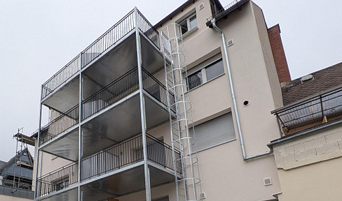 Erstbezug! Stilvolle 2-Zi KfW Neubauwohnung in Toplage von Rüdesheim mit Aufzug