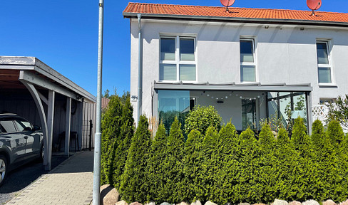 Moderne KfW-Doppelhaushälfte im Neubaugebiet – Wärmepumpe, Wallbox & Wintergarten