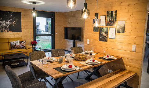 Furnished wooden house with 2 apartments, garden, and balcony, including kitchens - Windschläg, €970,000 plus VAT.