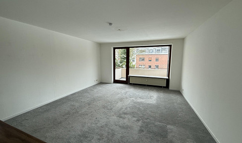 Spacious 3-room apartment with open-plan kitchen, balcony & underground parking space in Hamburg-Wilstorf
