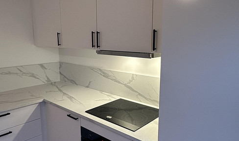 Moderne 1,5-Zimmer-Wohnung in zentraler Lage - Erstbezug nach Kernsanierung