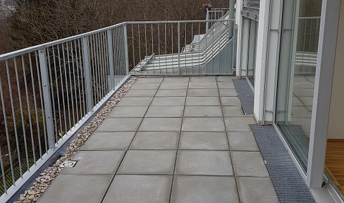 Commission-free air-conditioned. 2-room rooftop flat incl. underground parking space in Aspern