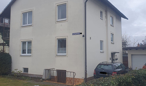 4-room apartment with a garden and a view of Rosenberg Castle.