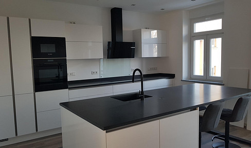 Brand new, energy-efficient, modern apartment with fitted kitchen and underfloor heating.